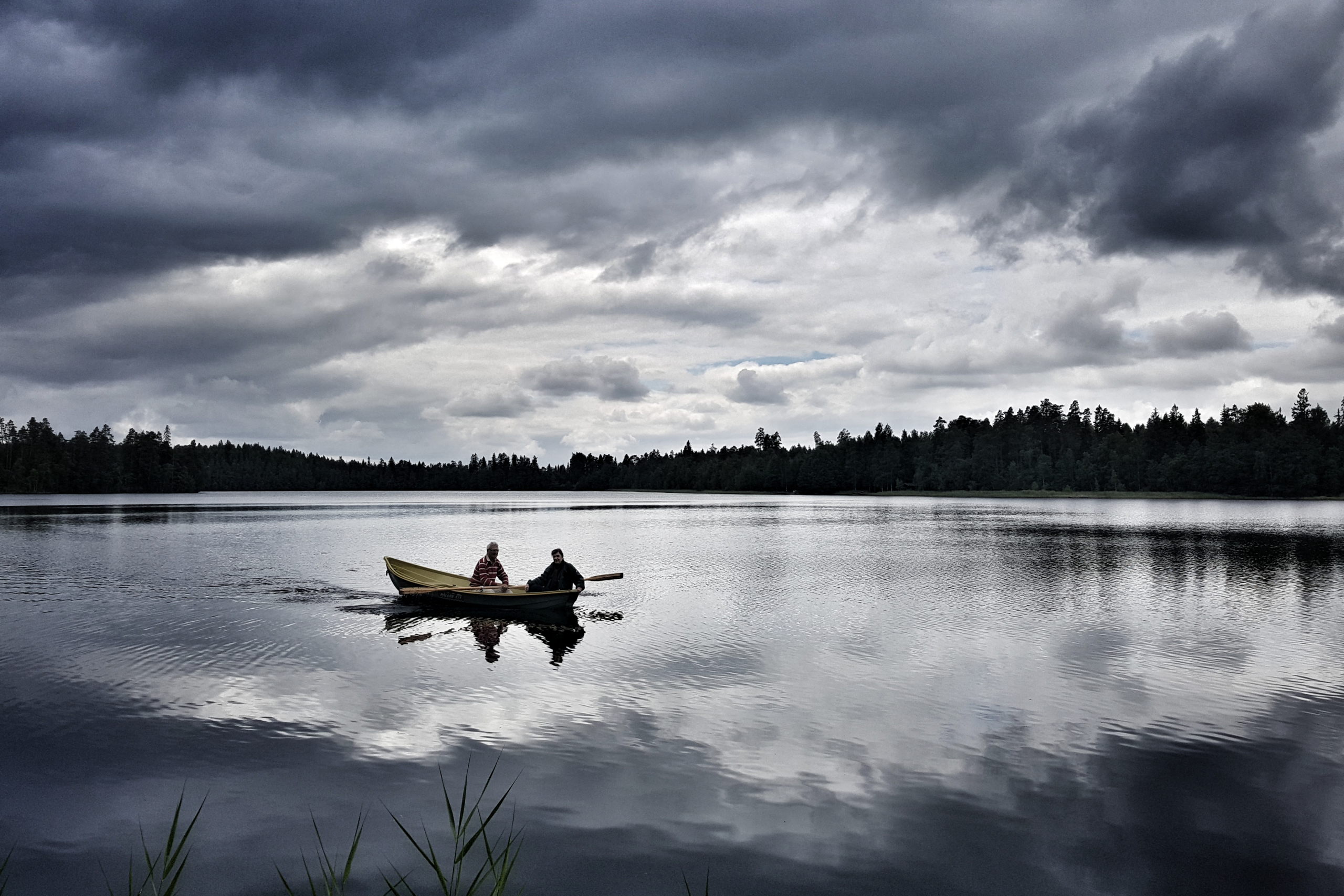 Rowingboat on a mirrorlake during finnishsummer 36844676901 o